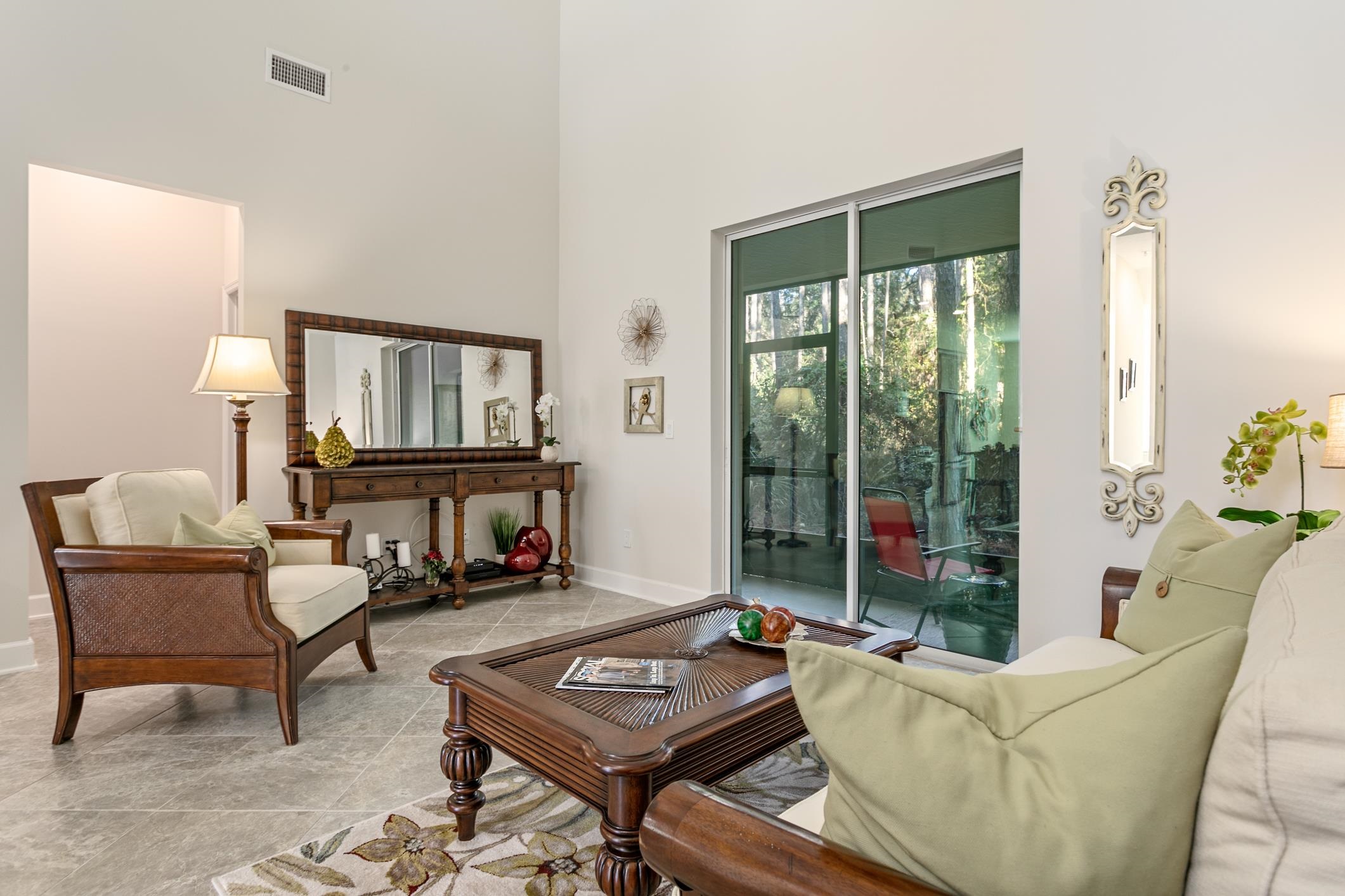 264 Grand Ravine Drive St. Augustine, FL 32086 - Photo 18 of 46 a living room with furniture and a window