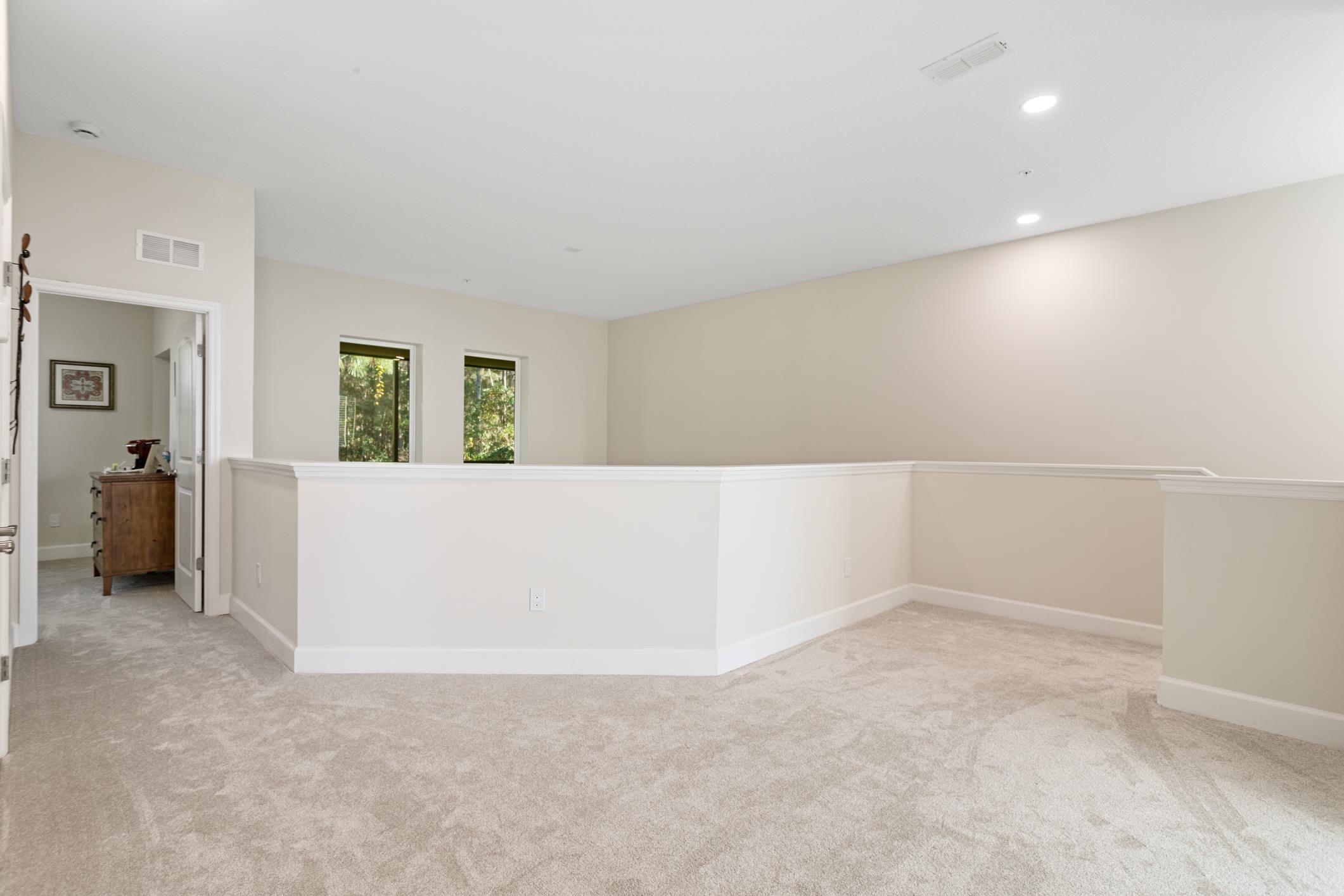 264 Grand Ravine Drive St. Augustine, FL 32086 - Photo 30 of 46 a view of a big room with closet and windows