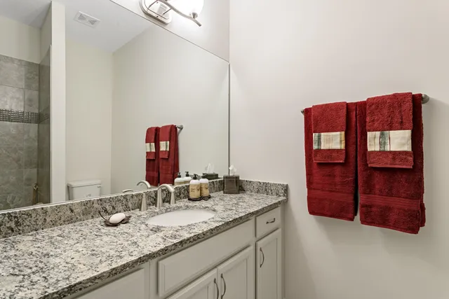 a bathroom with a bathtub and shower