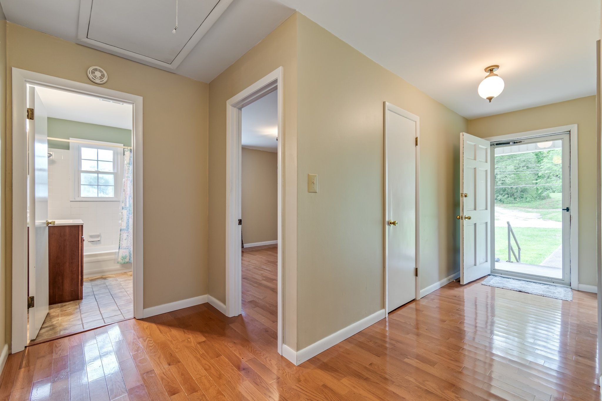 2737 Fly Road Santa Fe, TN 38482 - Photo 21 of 44 an empty room with wooden floor and windows