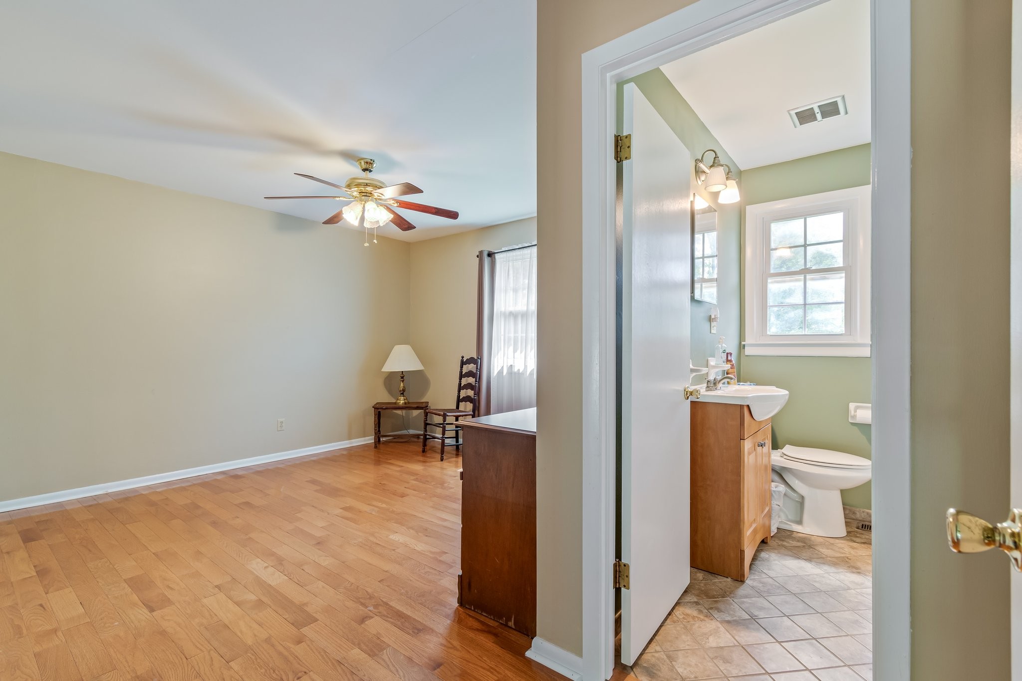 2737 Fly Road Santa Fe, TN 38482 - Photo 30 of 44 a view of a room with wooden floor and a bathroom