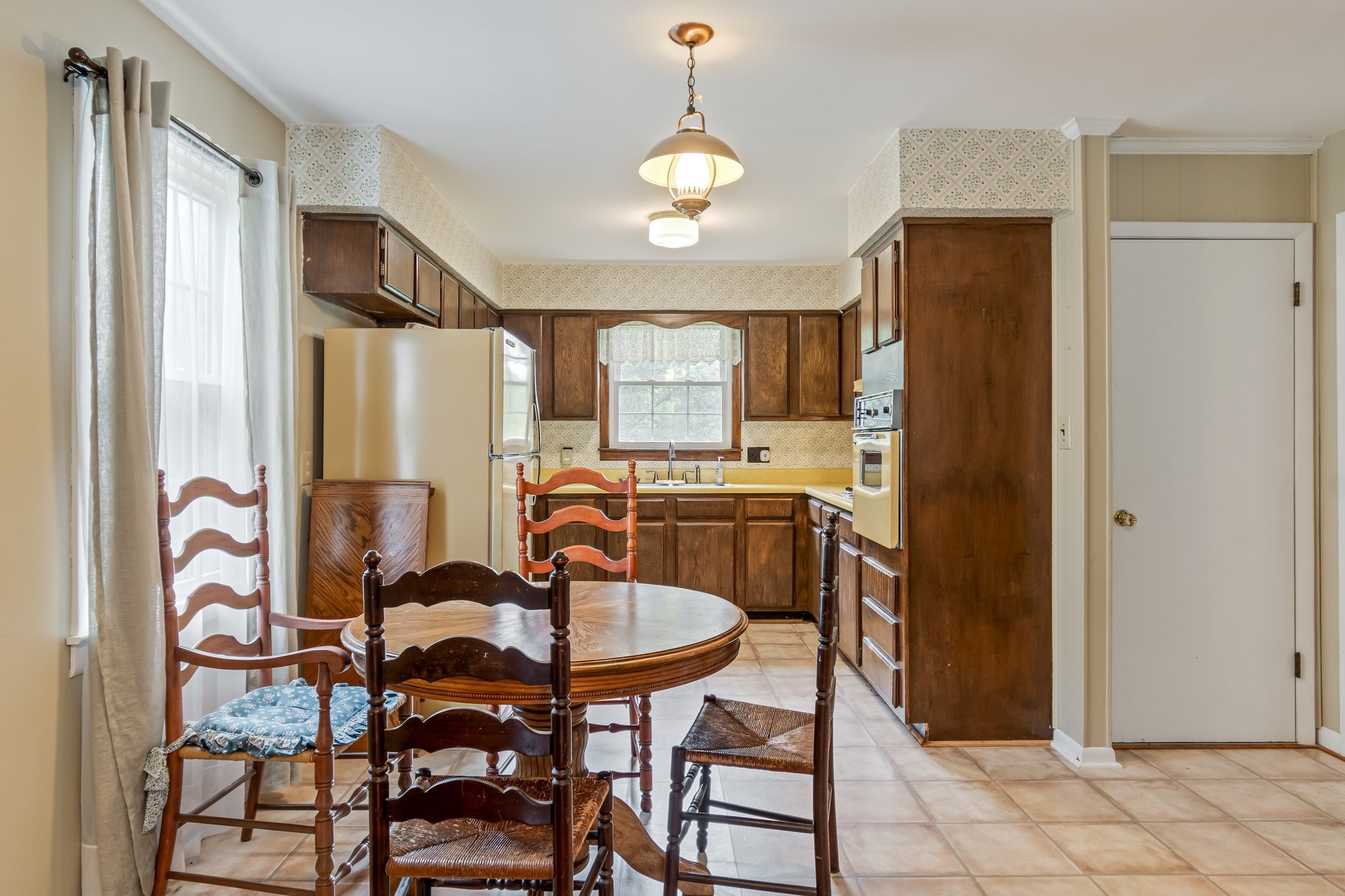2737 Fly Road Santa Fe, TN 38482 - Photo 9 of 44 a view of a dining room with furniture and a chandelier