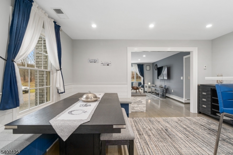 18 Old Wolfe Road Budd Lake, NJ 07828 - Photo 11 of 49 a living room with furniture and a table