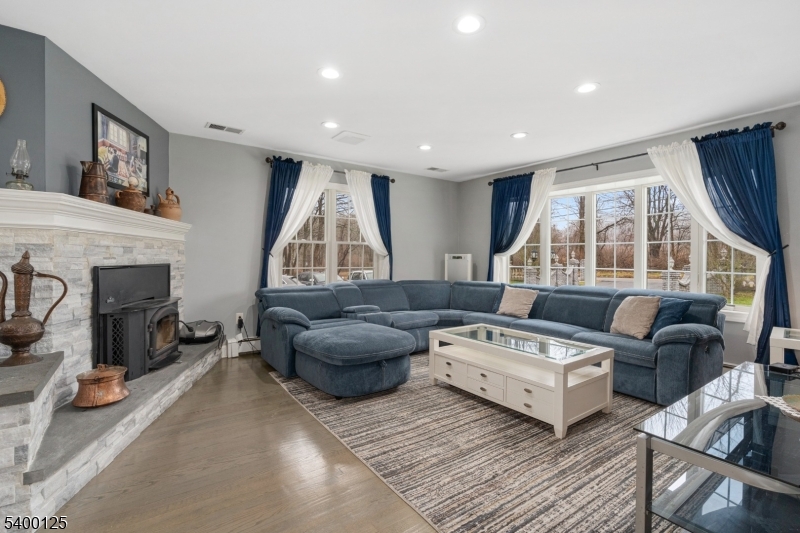 18 Old Wolfe Road Budd Lake, NJ 07828 - Photo 13 of 49 a living room with furniture and a fireplace