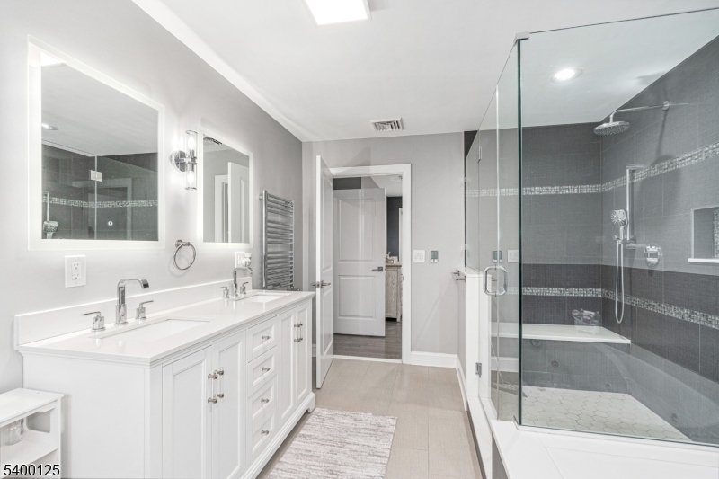 18 Old Wolfe Road Budd Lake, NJ 07828 - Photo 15 of 49 a bathroom with a double vanity sink mirror and double