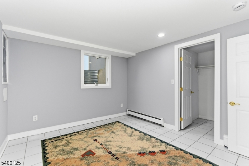 18 Old Wolfe Road Budd Lake, NJ 07828 - Photo 26 of 49 a view of a room with wooden floor and cabinet