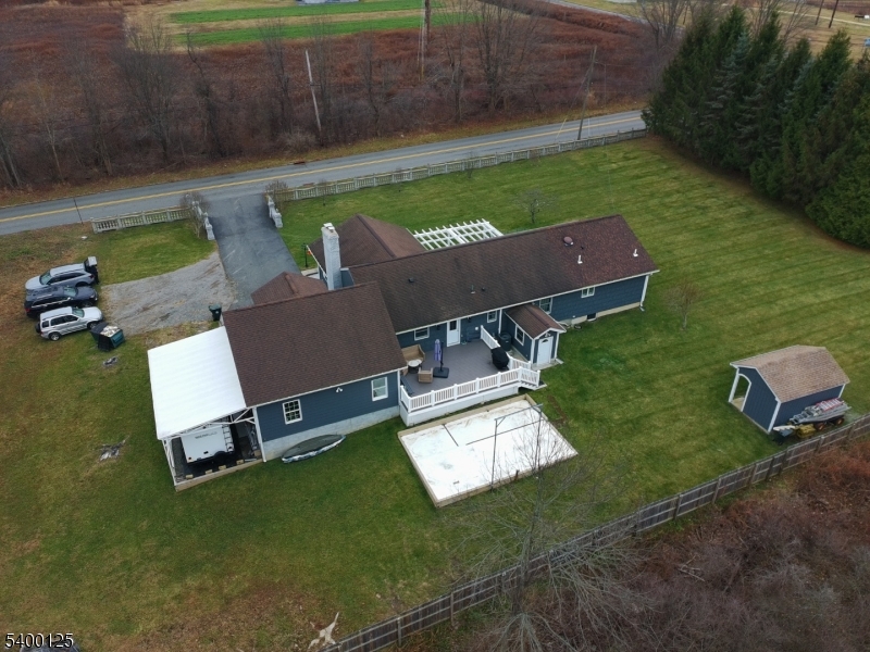 18 Old Wolfe Road Budd Lake, NJ 07828 - Photo 3 of 49 an aerial view of a house with backyard space and swimming pool