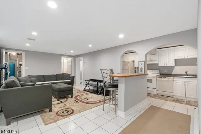 a living room with furniture and a table