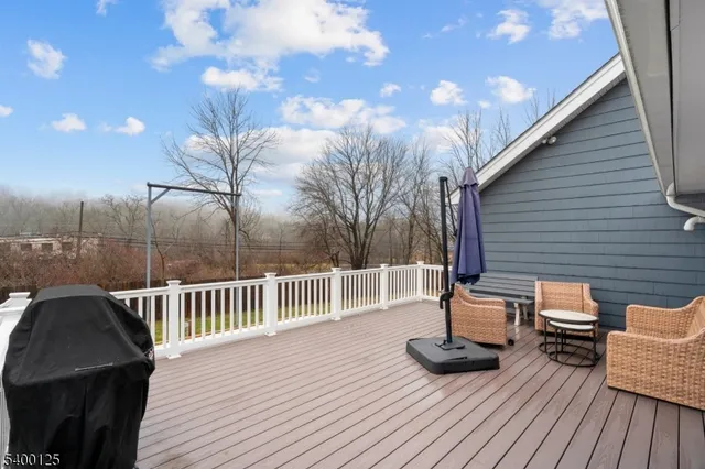 a view of a chairs on the deck