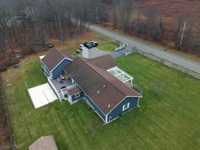 a view of a small deck with a yard