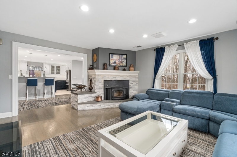 18 Old Wolfe Road Budd Lake, NJ 07828 - Photo 10 of 49 a living room with furniture and a fireplace