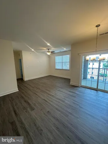 a view of a balcony with wooden floor
