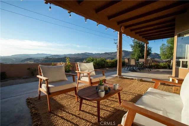 a patio with patio lots of furniture and outdoor view