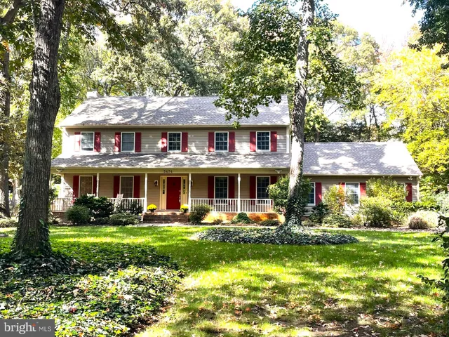 a view of balcony with wooden floor