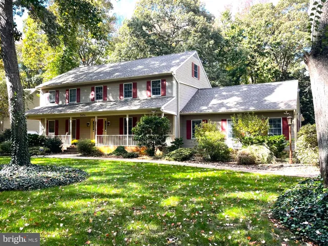 a workspace with furniture and wooden floor
