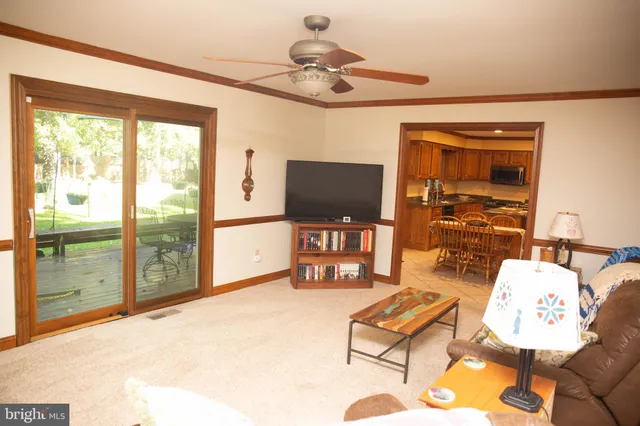 a bed room with a bed and a window