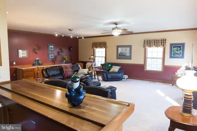 a kitchen with stainless steel appliances granite countertop a sink and a stove