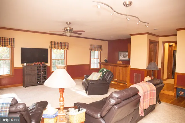 a view of a house with a yard and garage