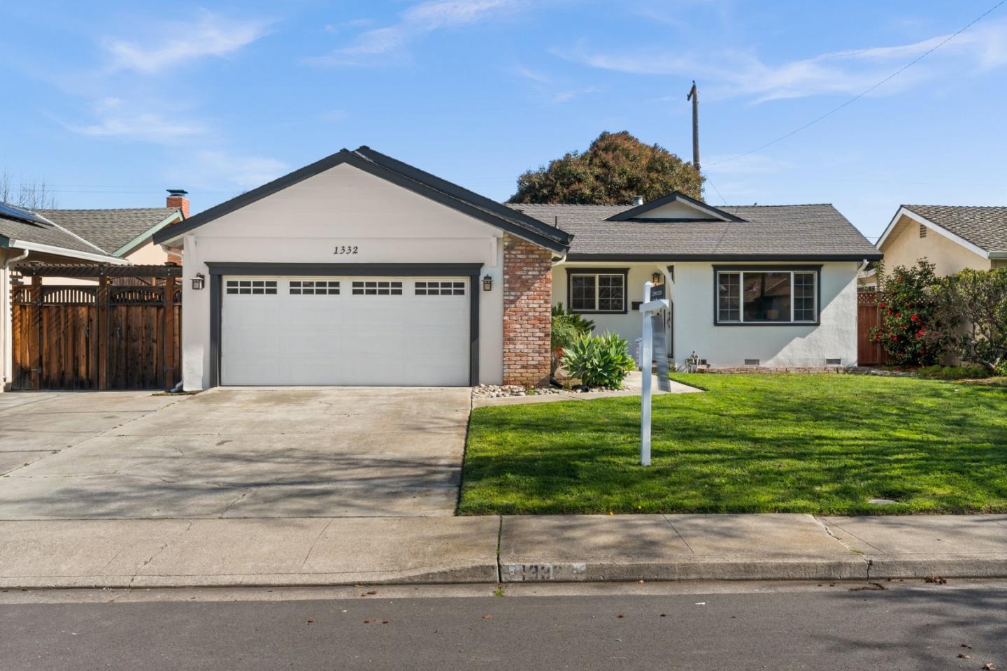 1332 Poe Lane San Jose, CA 95130 - Photo 1 of 32 a front view of a house with garden