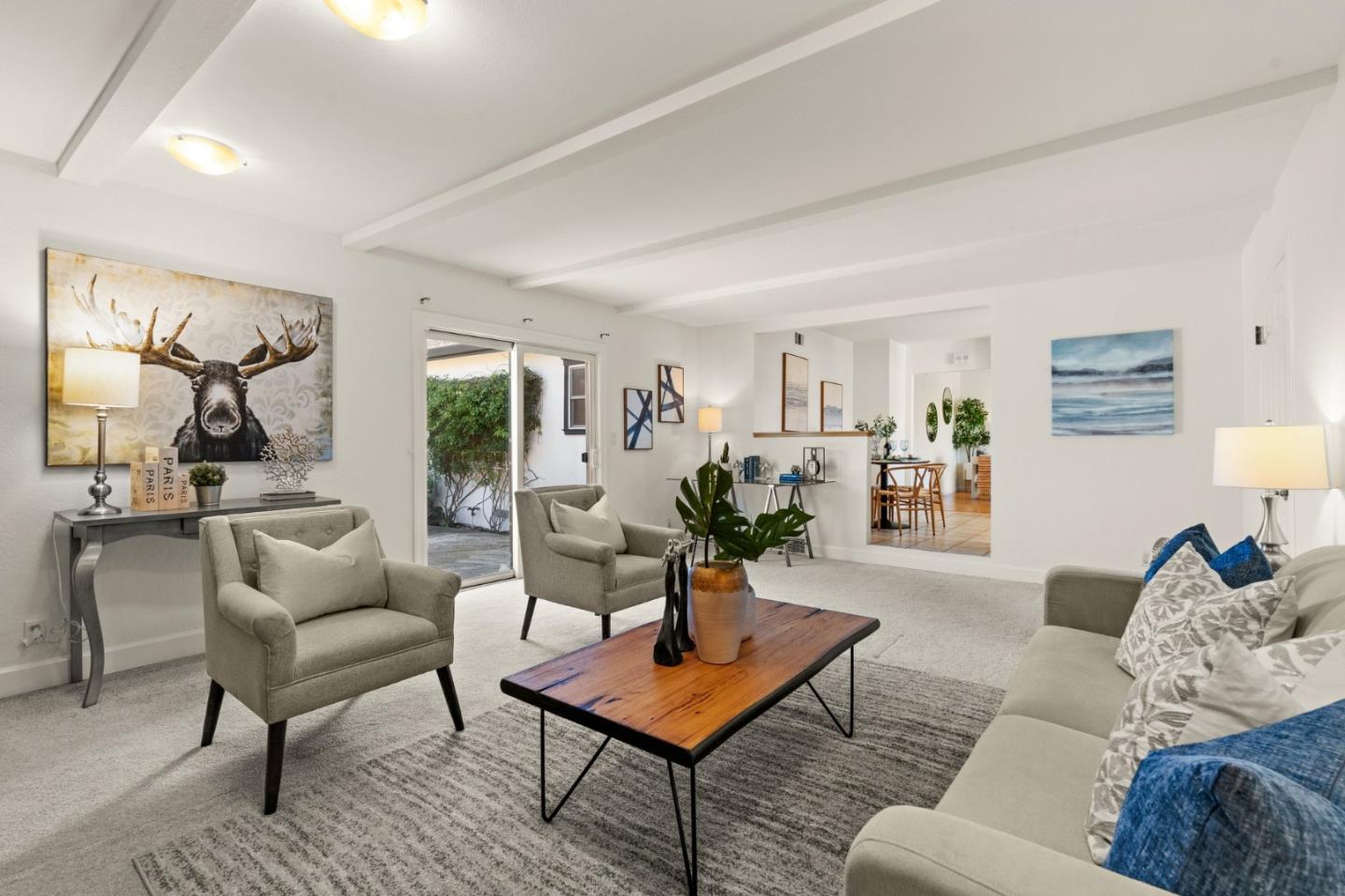 1332 Poe Lane San Jose, CA 95130 - Photo 13 of 32 a living room with furniture and a table