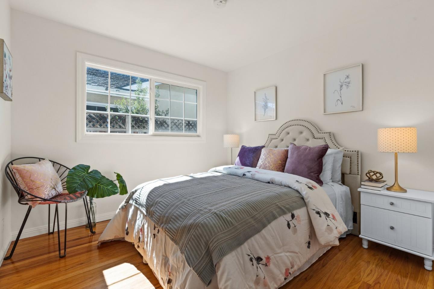 1332 Poe Lane San Jose, CA 95130 - Photo 19 of 32 a bedroom with a bed and window