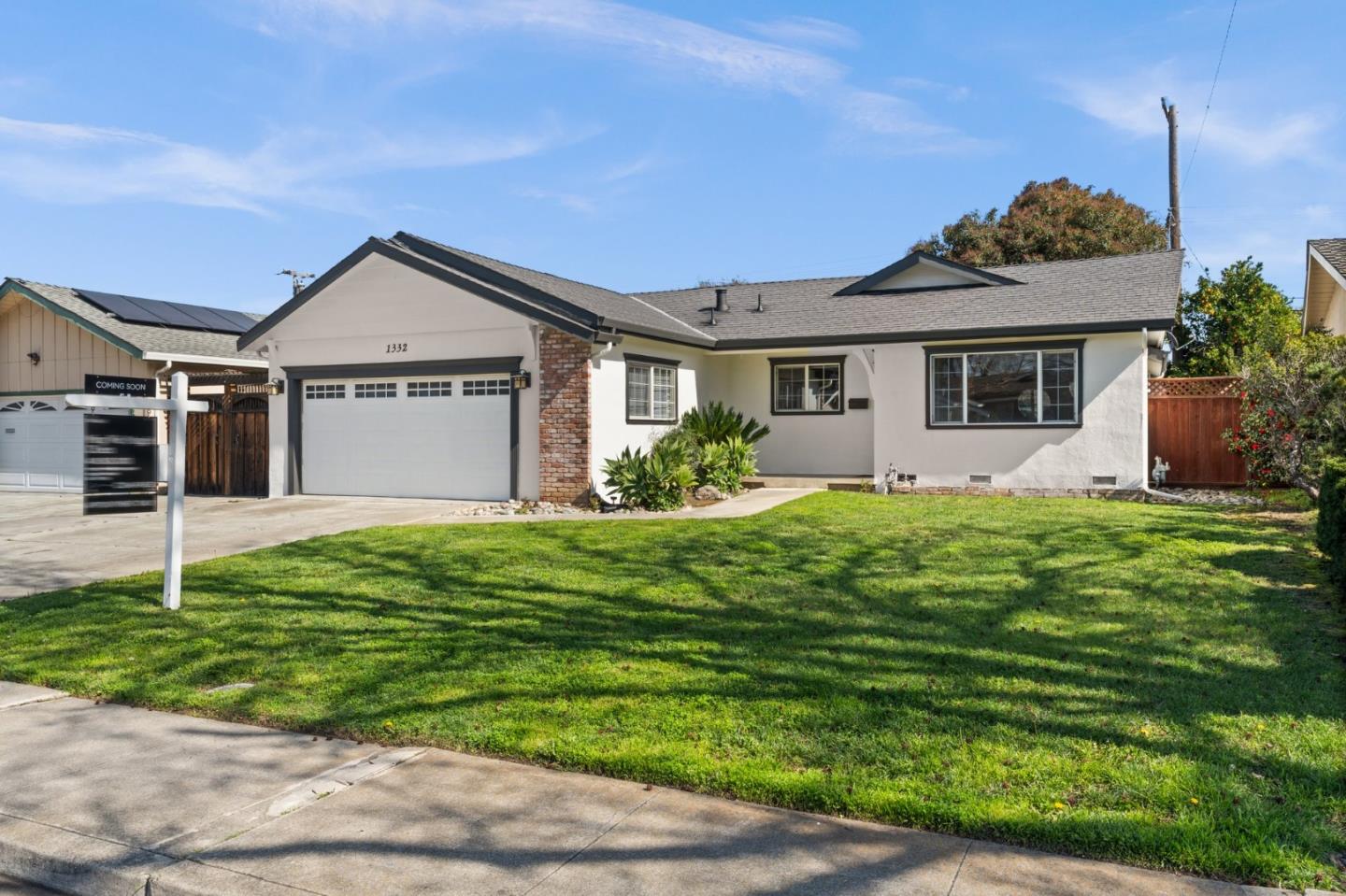 1332 Poe Lane San Jose, CA 95130 - Photo 2 of 32 a front view of a house with a garden