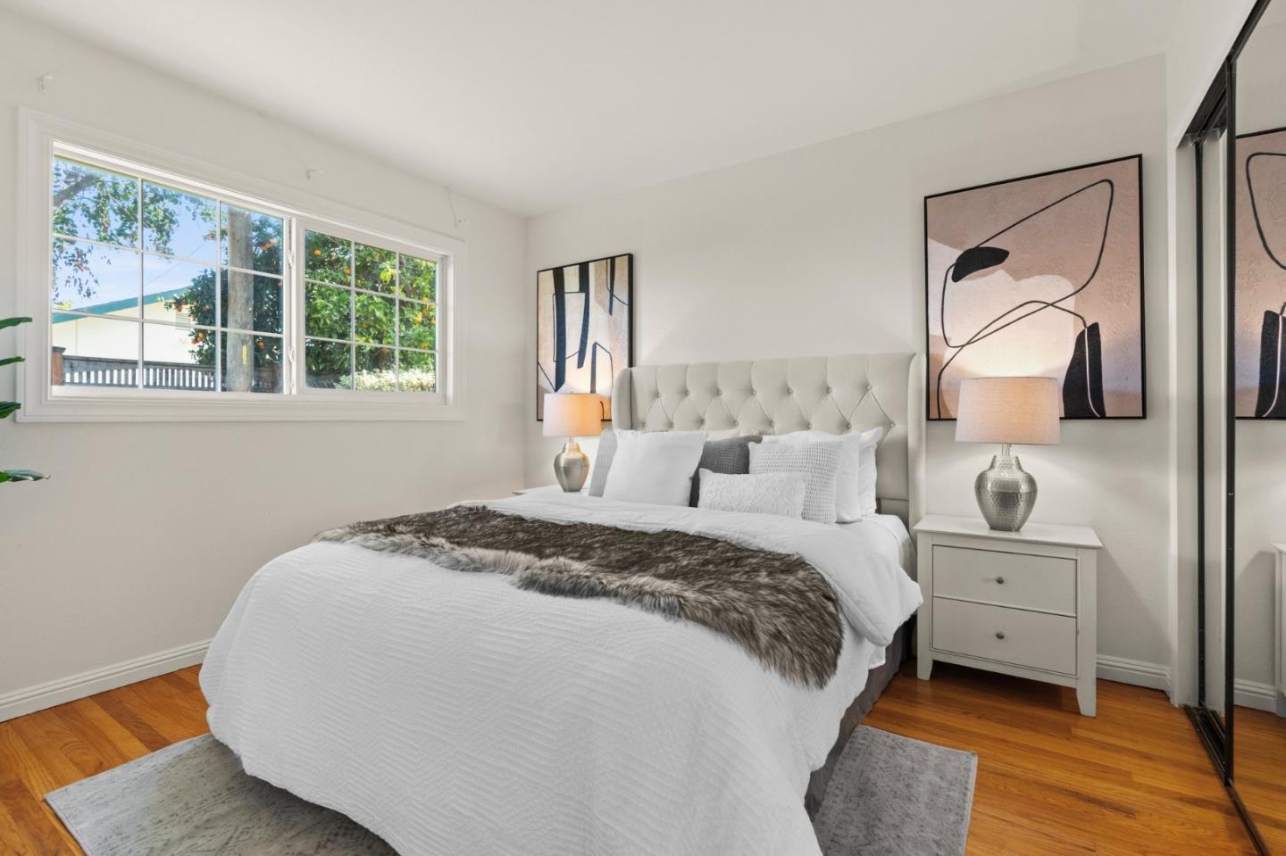 1332 Poe Lane San Jose, CA 95130 - Photo 23 of 32 a bedroom with a bed and a window