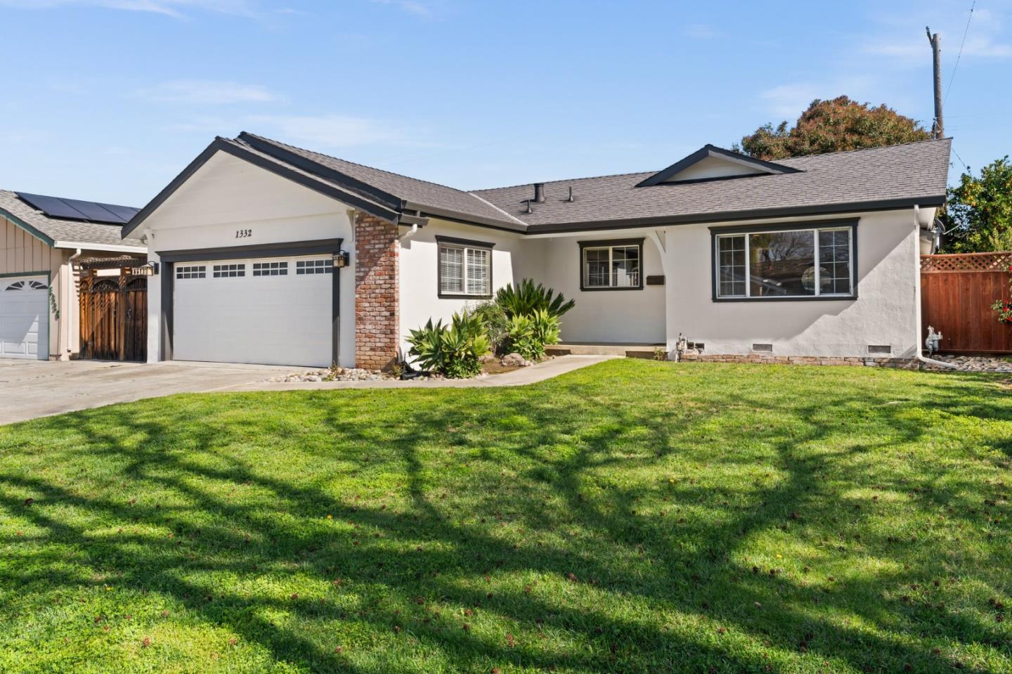 1332 Poe Lane San Jose, CA 95130 - Photo 30 of 32 a front view of house with yard and green space