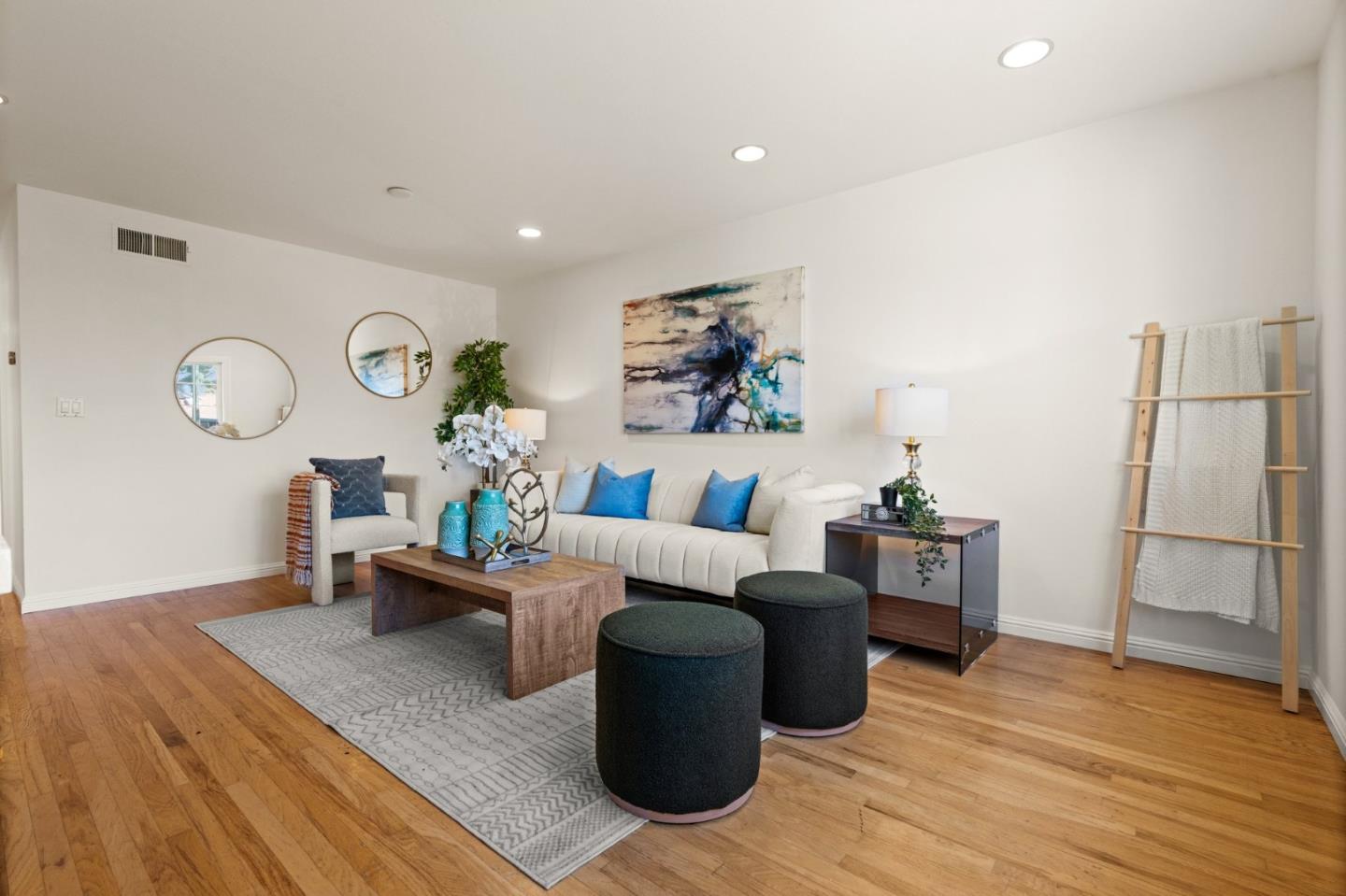 1332 Poe Lane San Jose, CA 95130 - Photo 4 of 32 a living room with furniture and wooden floor