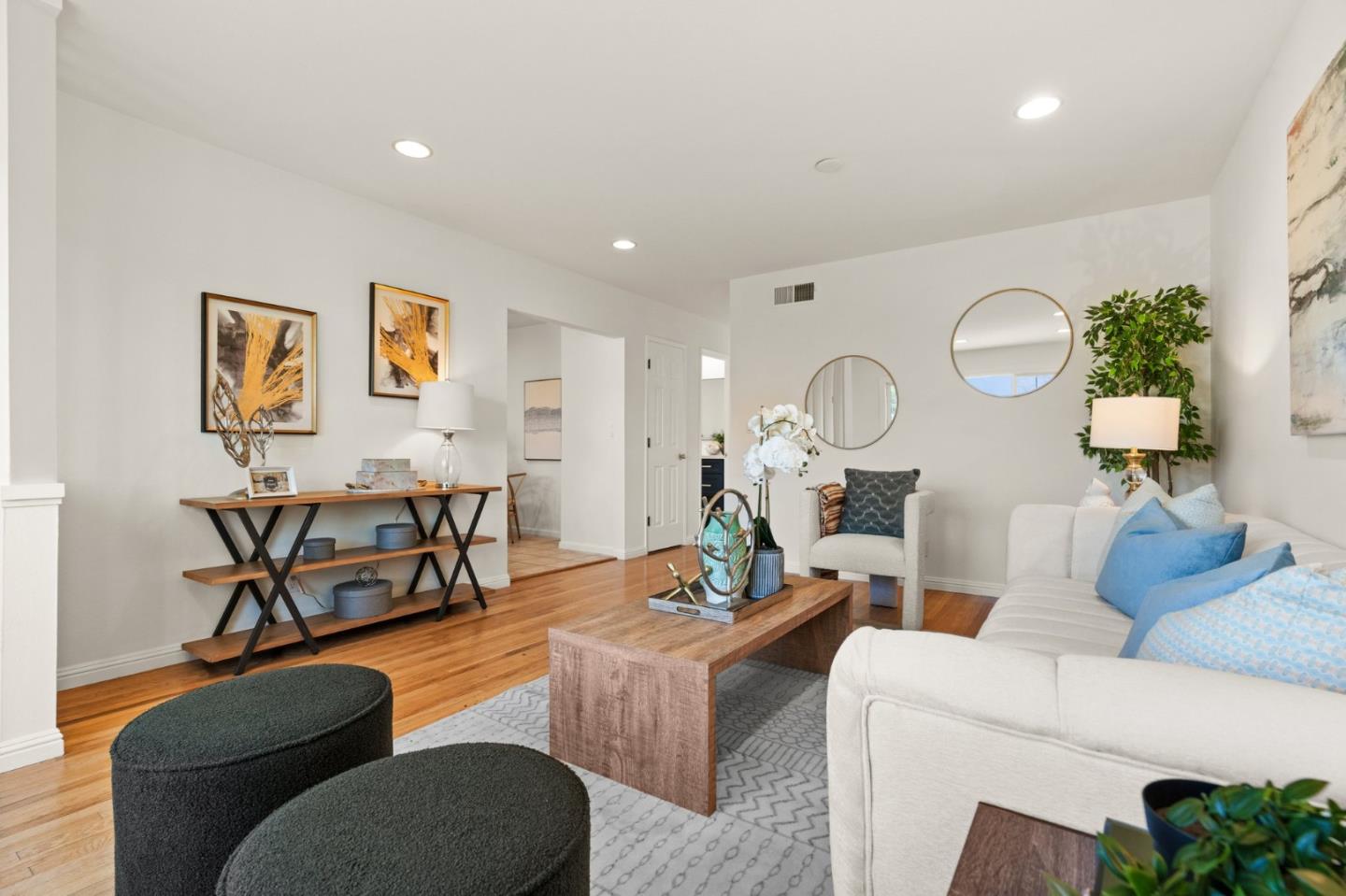 1332 Poe Lane San Jose, CA 95130 - Photo 5 of 32 a living room with furniture