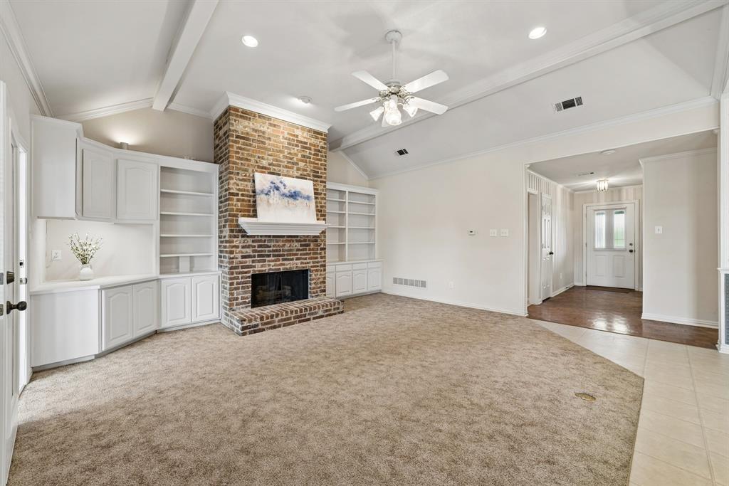 1175 Bloom Street Lucas, TX 75002 - Photo 8 of 36 an empty room with windows and fireplace