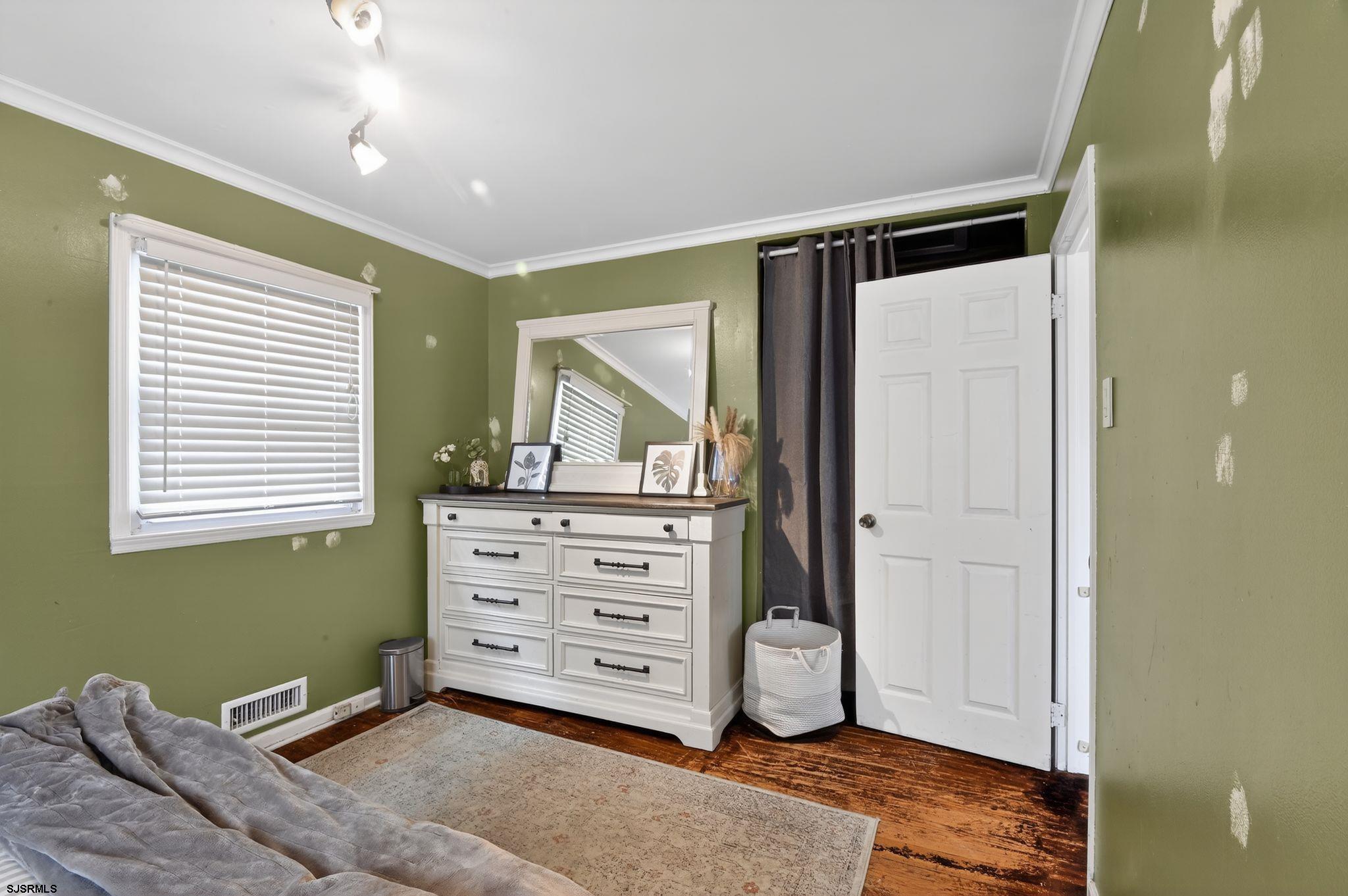 5 Merion Drive Somers Point, NJ 08244 - Photo 17 of 29 a room with a bed and a window