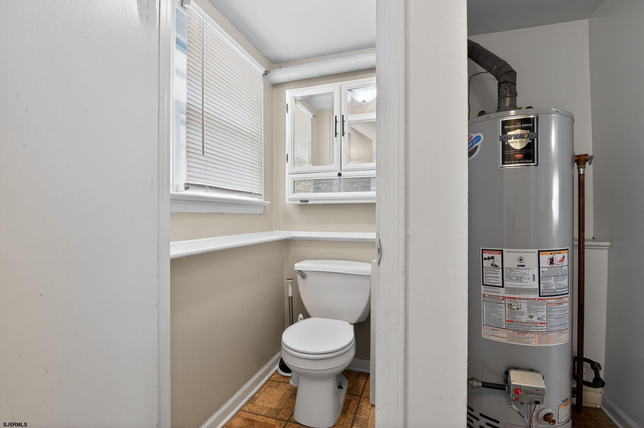 5 Merion Drive Somers Point, NJ 08244 - Photo 23 of 29 a bathroom with a toilet and a sink