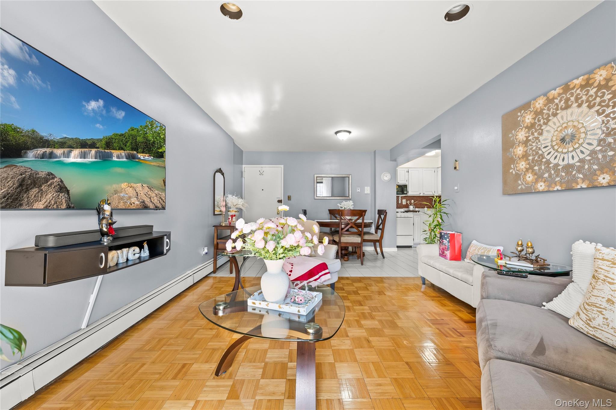 56-09 Van Cleef Street Queens, NY 11368 - Photo 3 of 14 a living room with furniture and a floor to ceiling window