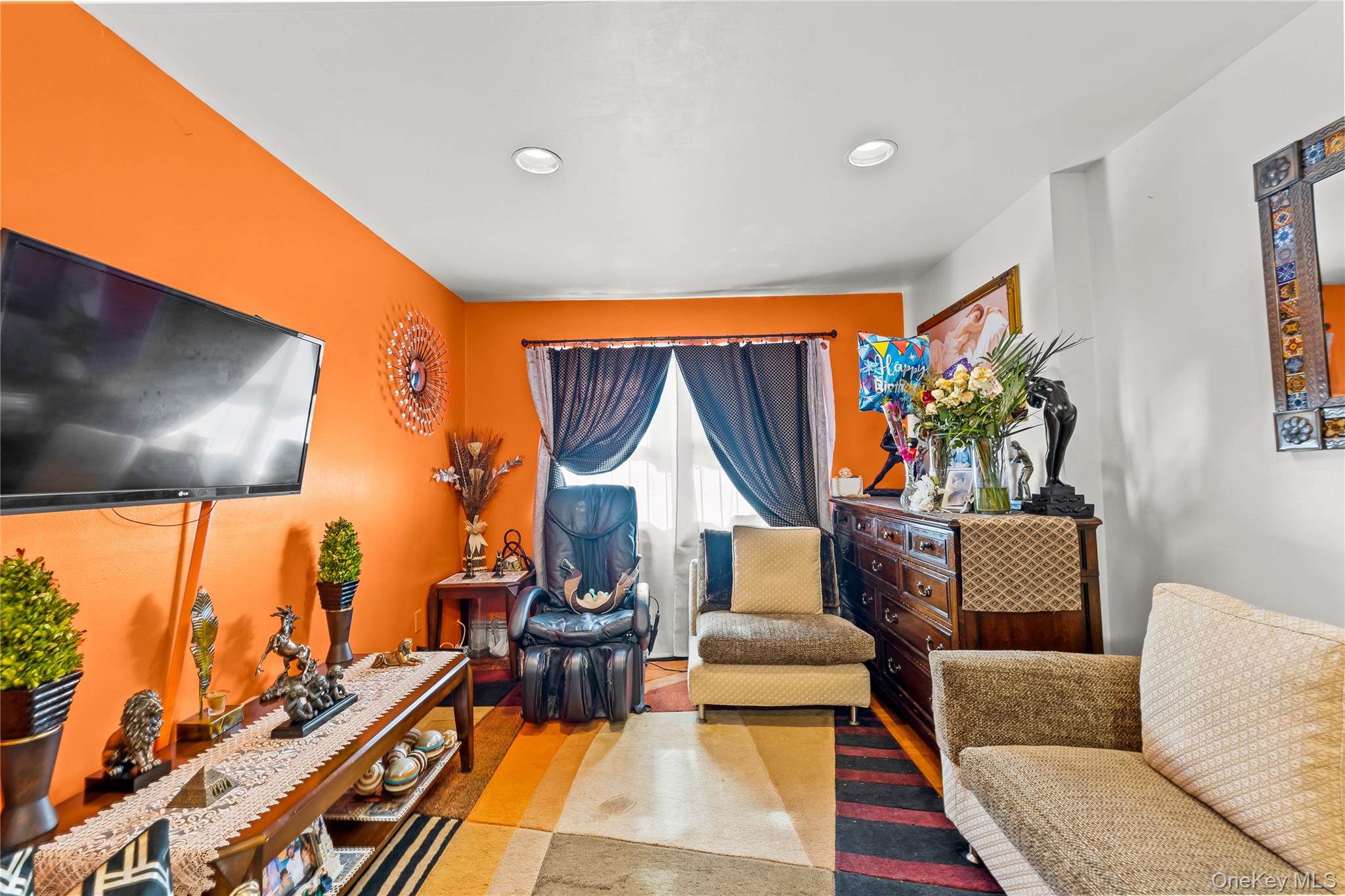 56-09 Van Cleef Street Queens, NY 11368 - Photo 6 of 14 a outdoor living space with furniture and a flat screen tv