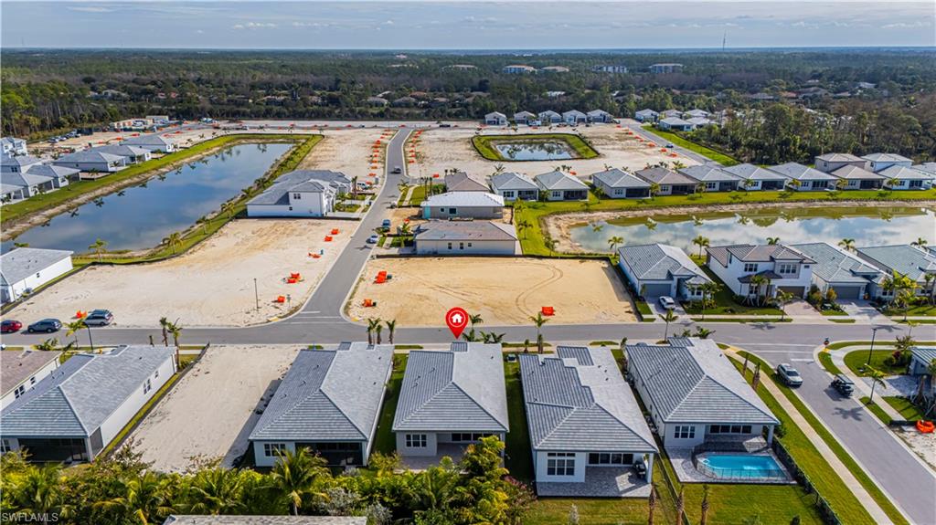 2691 Ridgecrest Place Naples, FL 34112 - Photo 4 of 27 an aerial view of residential houses with outdoor space and river