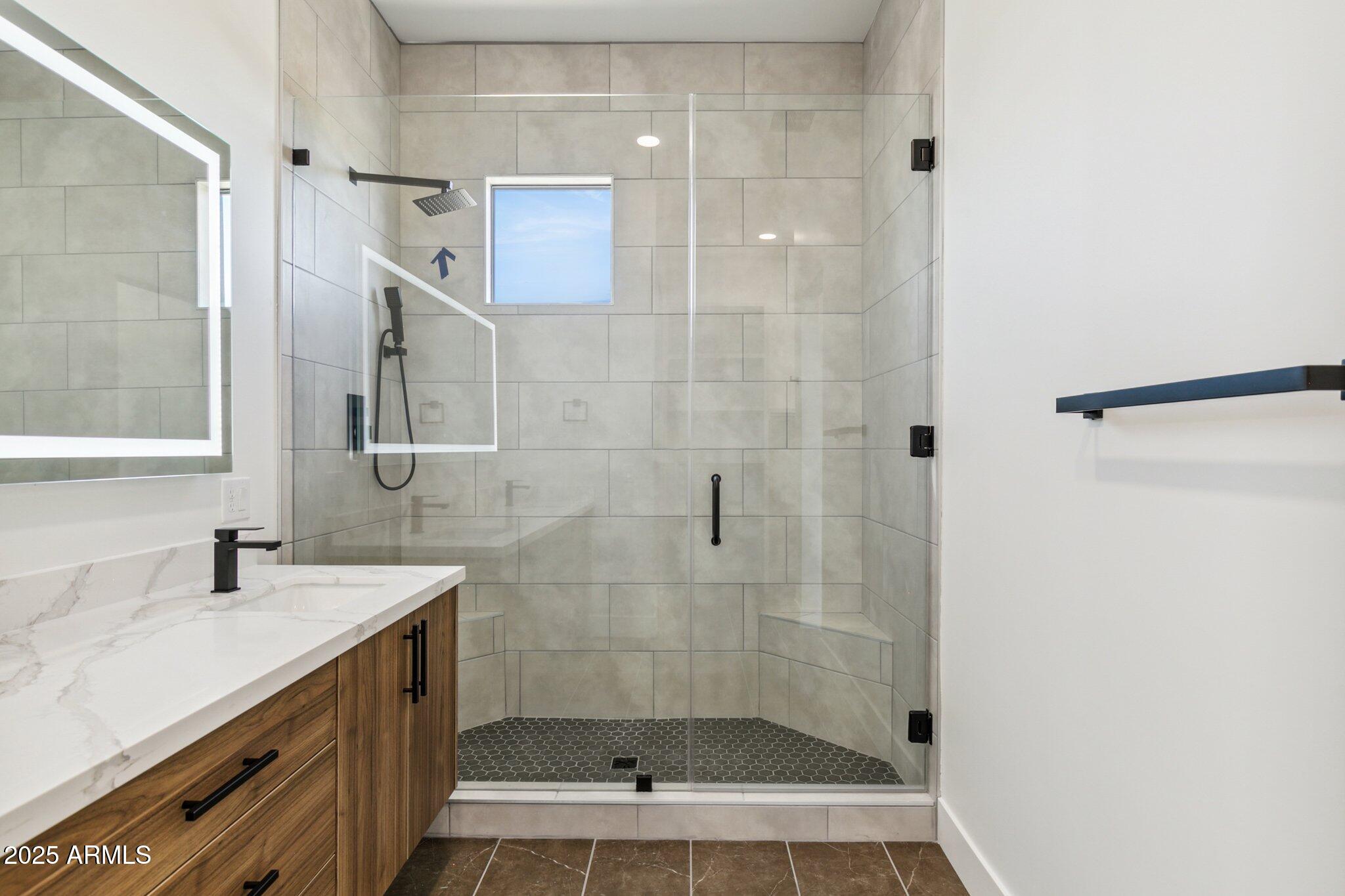 1501 North Miller Road, Unit 1016 Scottsdale, AZ 85257 - Photo 15 of 23 a bathroom with a shower and a sink