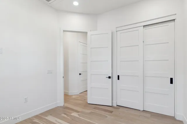a view of a house with a door and a yard