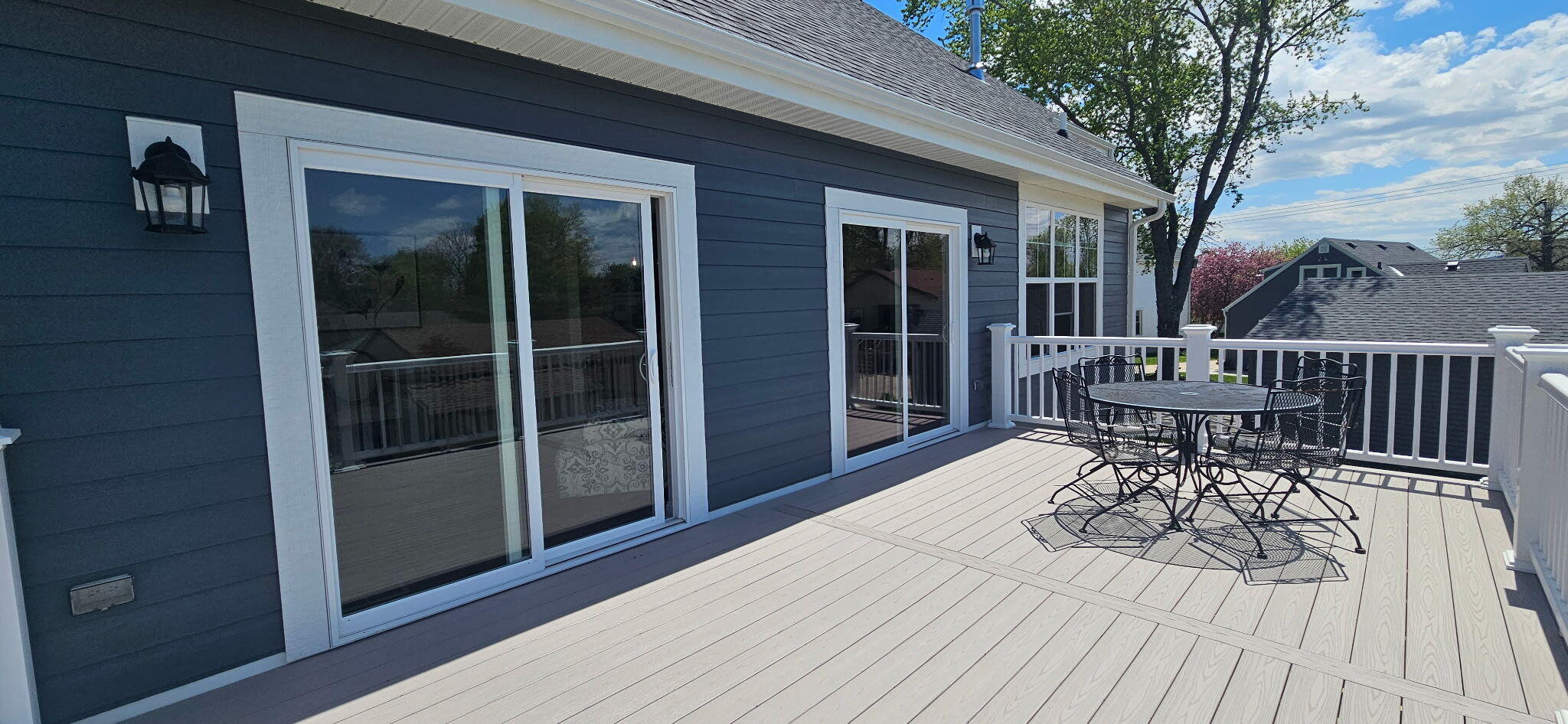 327 Sandy Circle Pewaukee, WI 53072 - Photo 25 of 40 Deck w/dual sliding doors