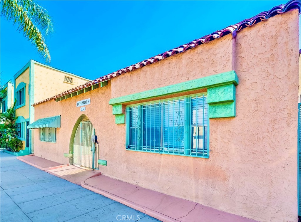 234 Lime Avenue, Unit A Long Beach, CA 90802 - Photo 15 of 15 a front view of a house with garden