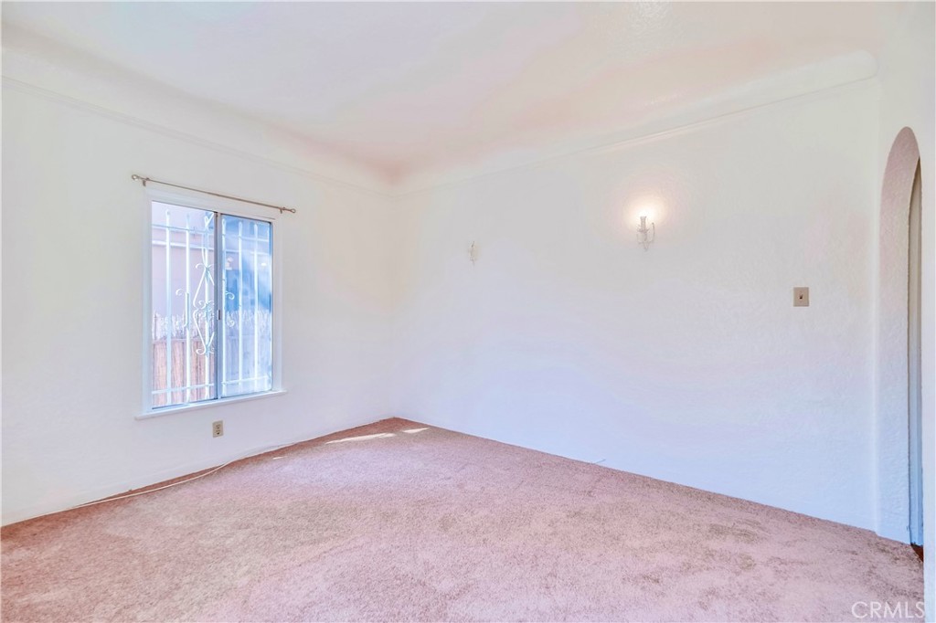 234 Lime Avenue, Unit A Long Beach, CA 90802 - Photo 10 of 15 an empty room with windows and closet