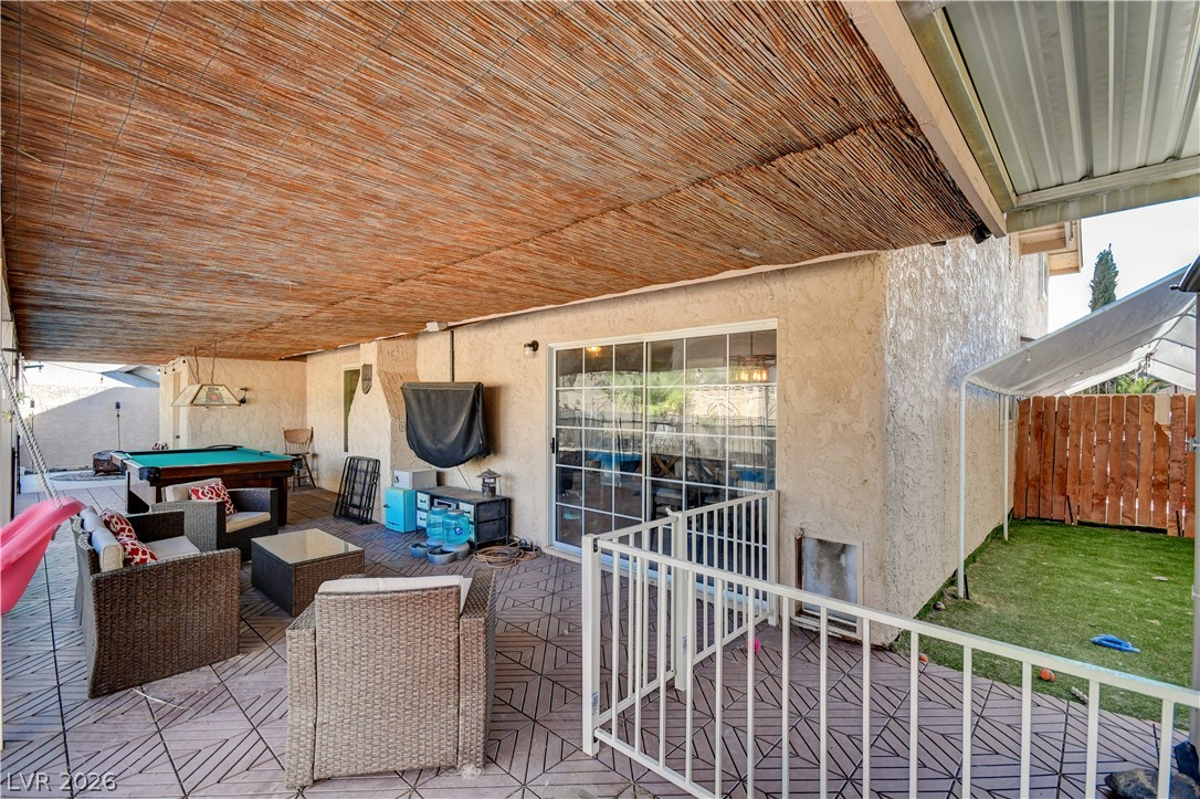 659 Arrayo Way Boulder City, NV 89005 - Photo 27 of 29 A spacious covered patio provides a shaded outdoor retreat perfect for relaxation and recreation.
