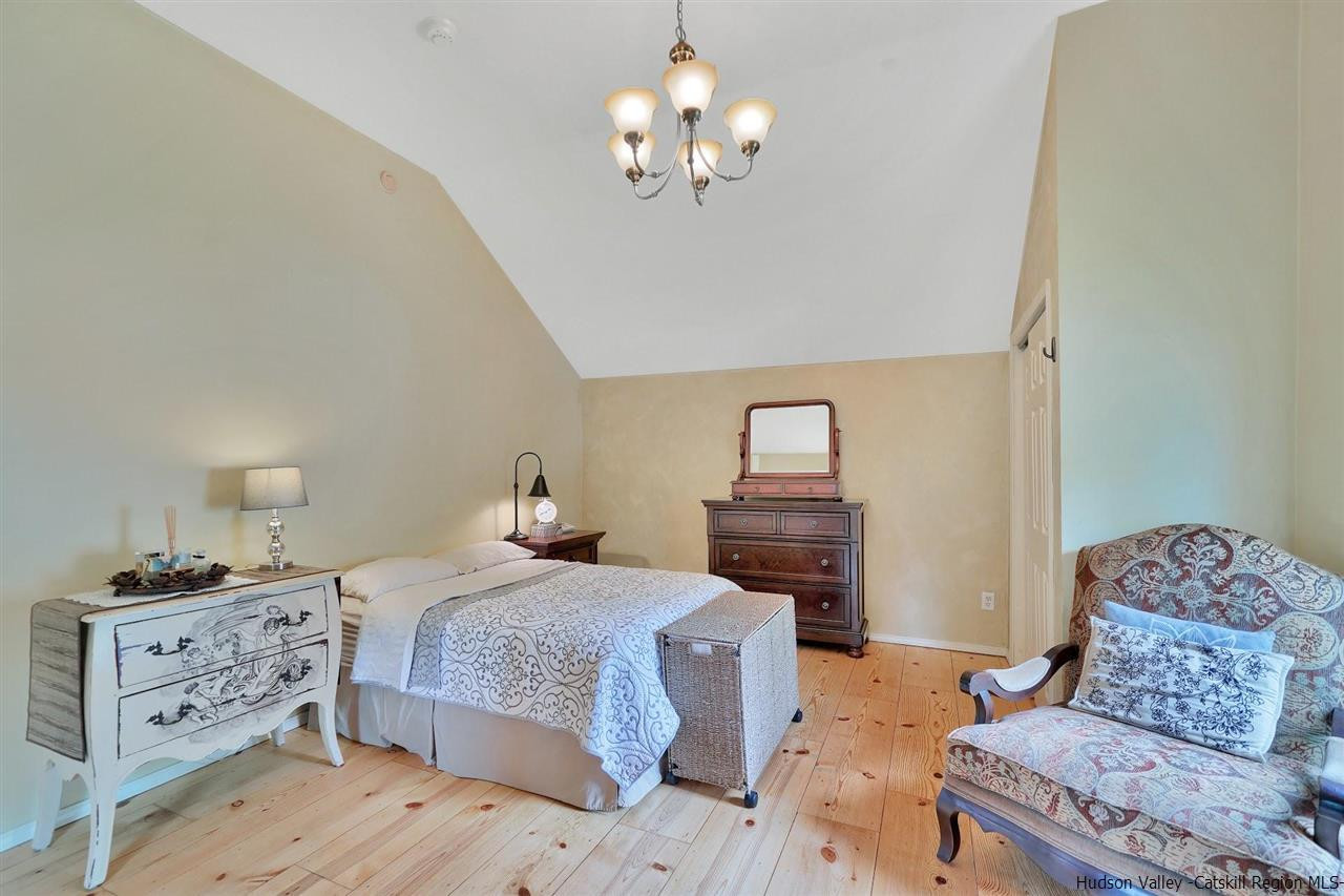 78 E Road Wallkill, NY 12589 - Photo 14 of 27 a bedroom with a bed and ceiling fan
