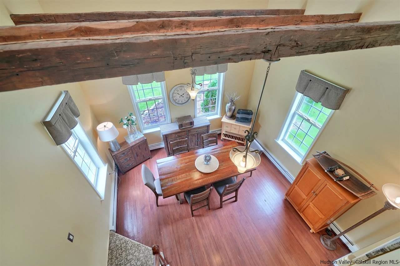 78 E Road Wallkill, NY 12589 - Photo 17 of 27 a living room with furniture and a wooden floor