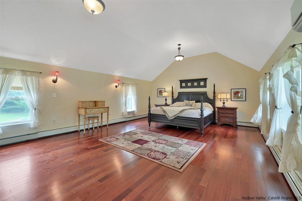 78 E Road Wallkill, NY 12589 - Photo 18 of 27 a living room with furniture and a wooden floor