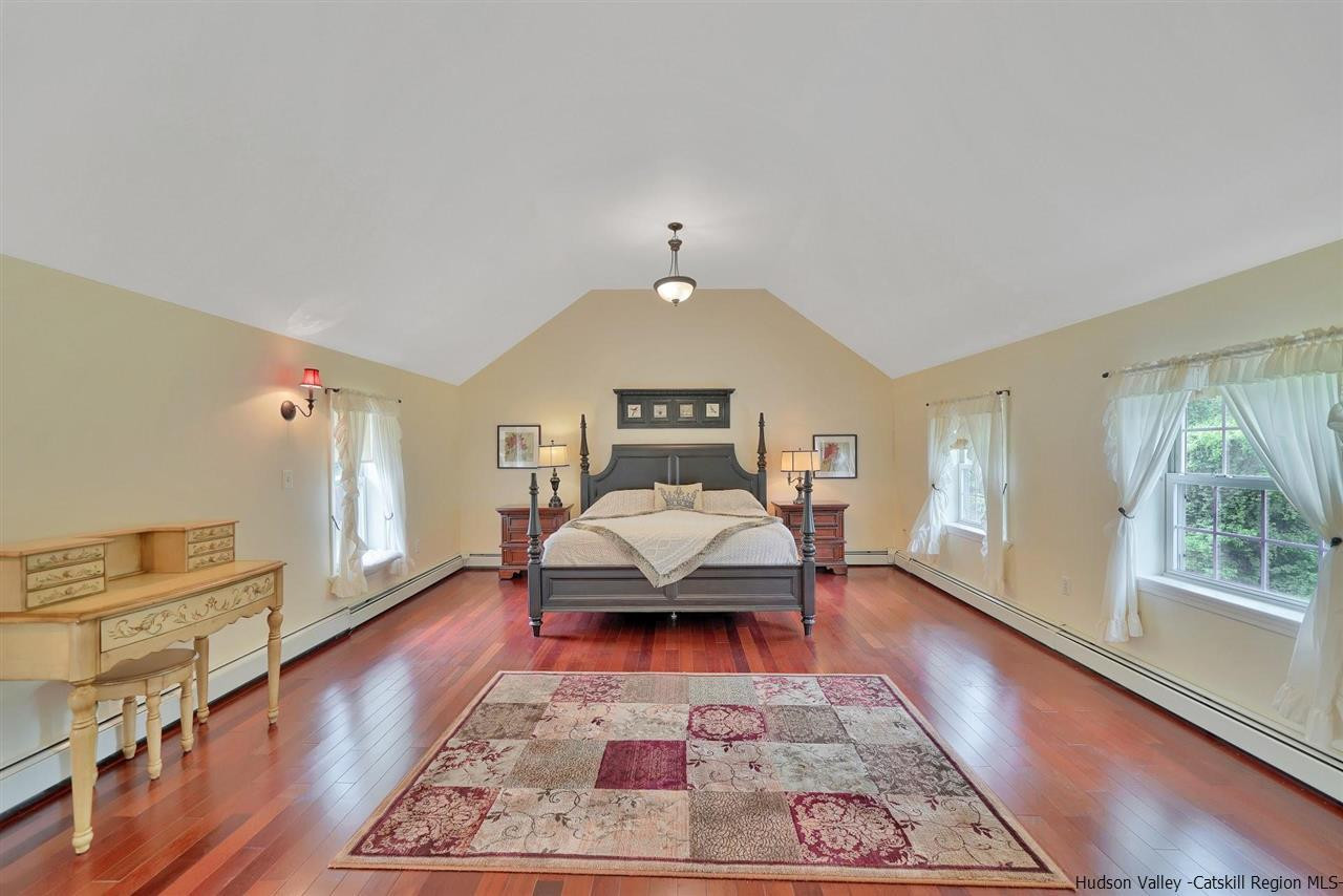 78 E Road Wallkill, NY 12589 - Photo 19 of 27 a living room with furniture and a fireplace