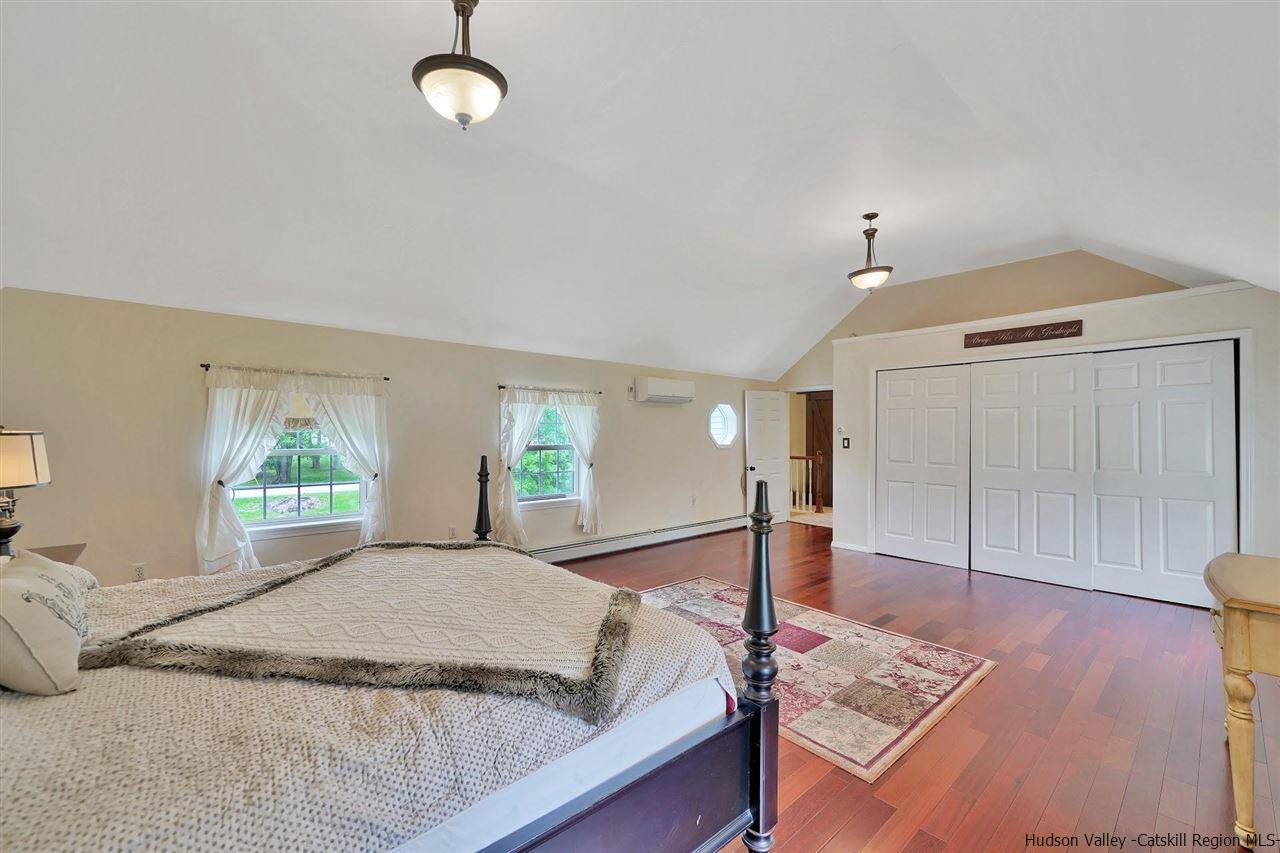 78 E Road Wallkill, NY 12589 - Photo 21 of 27 a bed room with a bed and window
