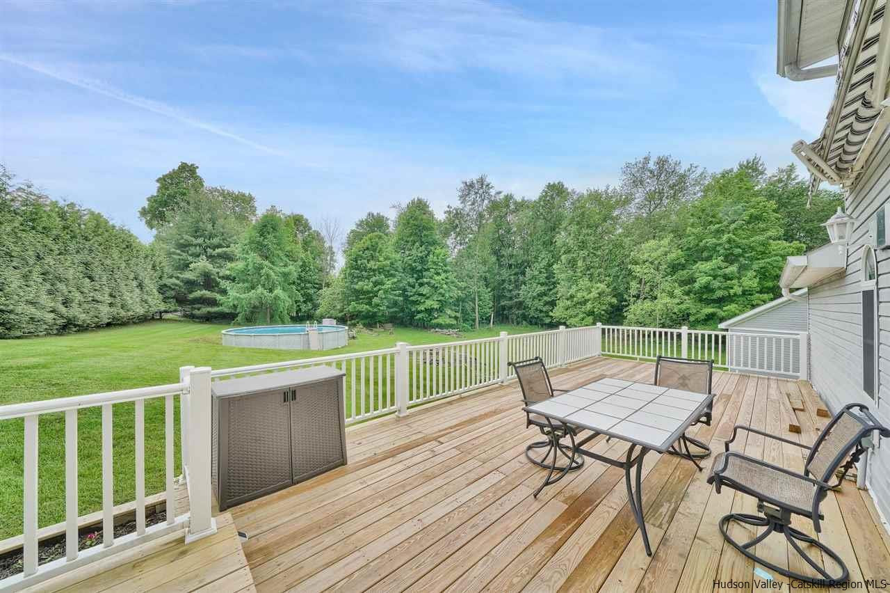 78 E Road Wallkill, NY 12589 - Photo 25 of 27 a view of a chairs and table on the wooden floor