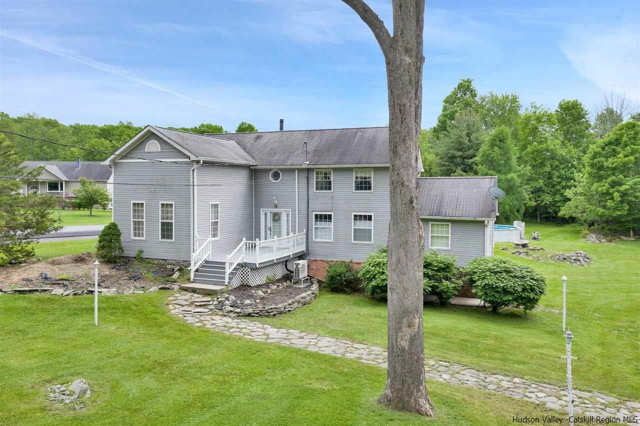 78 E Road Wallkill, NY 12589 - Photo 27 of 27 a front view of a house with garden