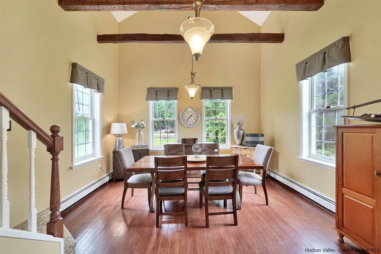 78 E Road Wallkill, NY 12589 - Photo 6 of 27 a view of a dining room with furniture window and wooden floor